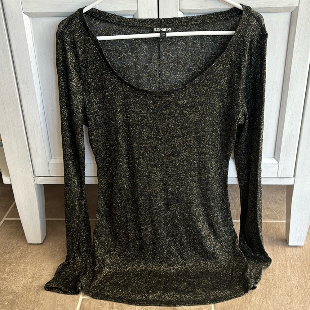 Women’s black with gold thread,  long sleeve shirt with round neck.